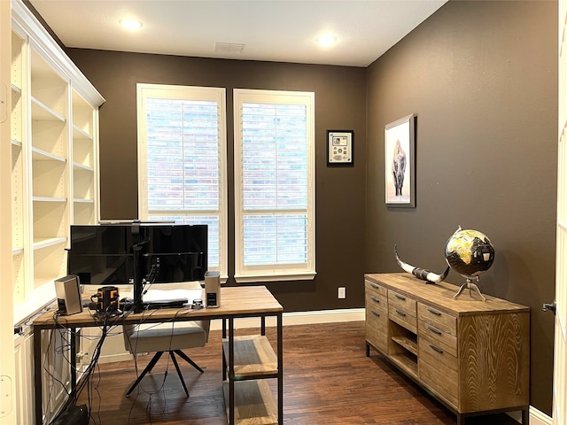 office with dark hardwood / wood-style floors