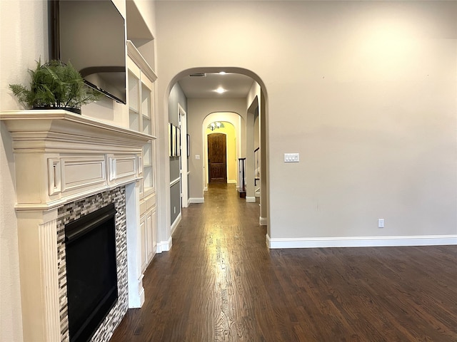 hall featuring dark wood-type flooring