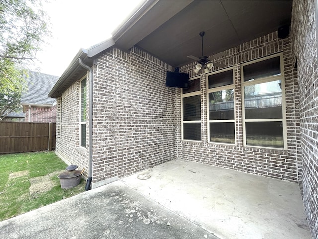 view of patio / terrace featuring ceiling fan