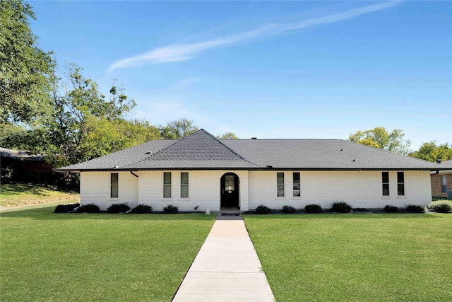 ranch-style house with a front yard