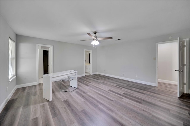 unfurnished room featuring ceiling fan and light hardwood / wood-style flooring