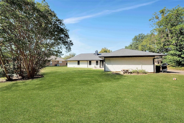 exterior space with a lawn