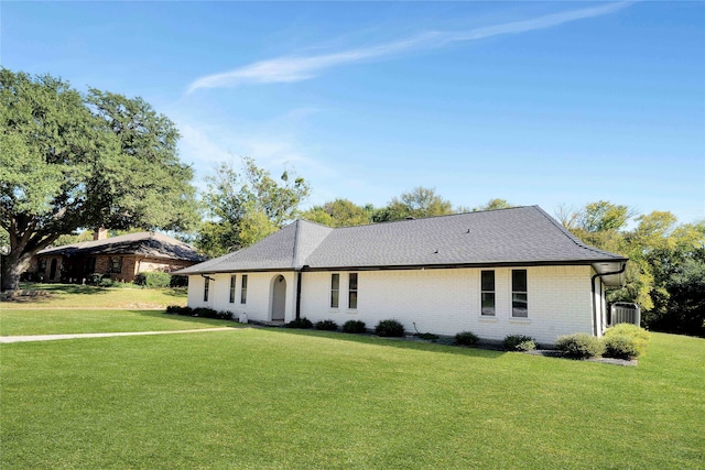 exterior space with a yard