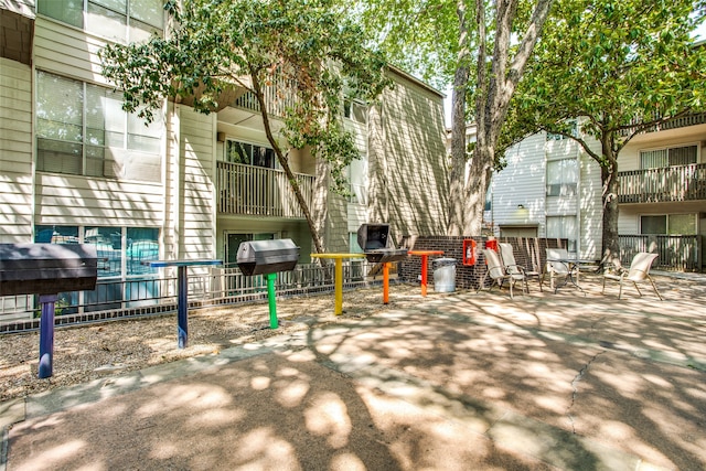 view of community with a patio