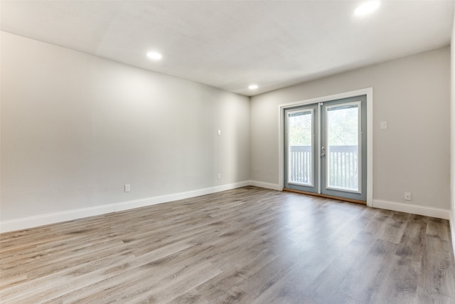 empty room featuring light hardwood / wood-style floors