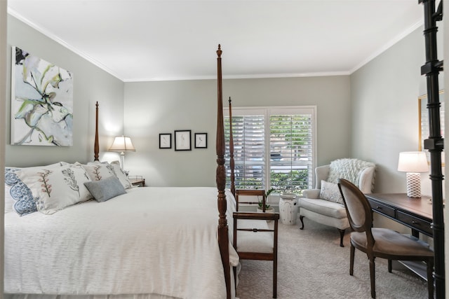 bedroom featuring crown molding and carpet