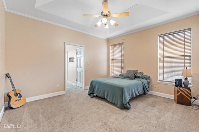 bedroom with multiple windows, ornamental molding, and light colored carpet