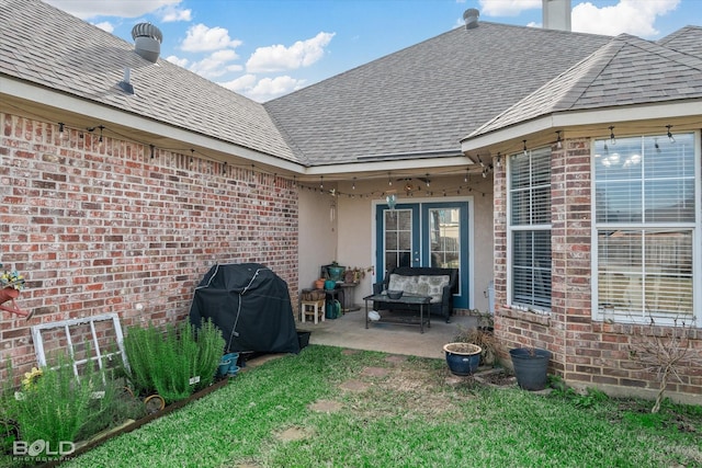 exterior space with grilling area and french doors