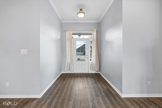 foyer featuring dark hardwood / wood-style flooring and ornamental molding