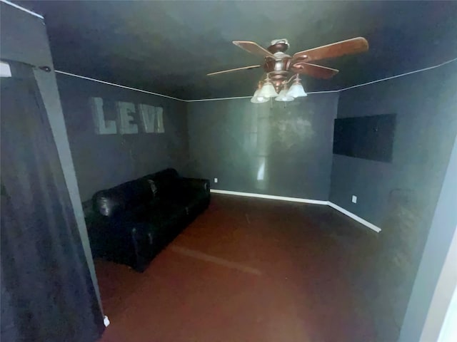 interior space with ceiling fan