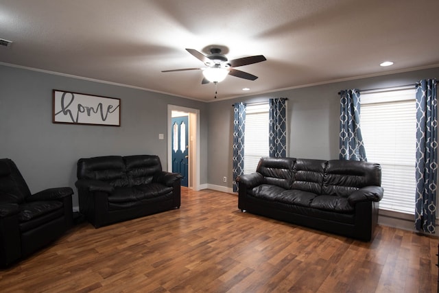 living room with ceiling fan, ornamental molding, and dark hardwood / wood-style floors