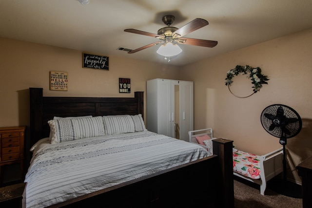 carpeted bedroom with ceiling fan