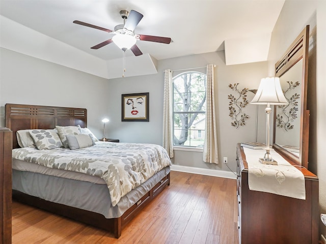 bedroom featuring hardwood / wood-style floors and ceiling fan