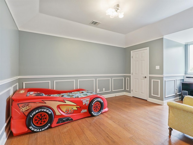 bedroom featuring hardwood / wood-style flooring