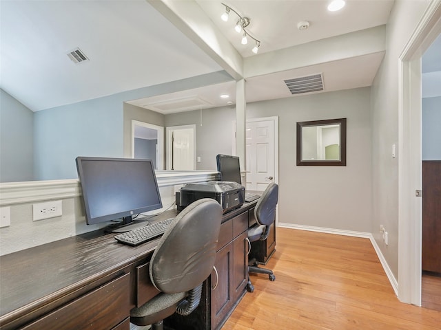 office area with light hardwood / wood-style floors