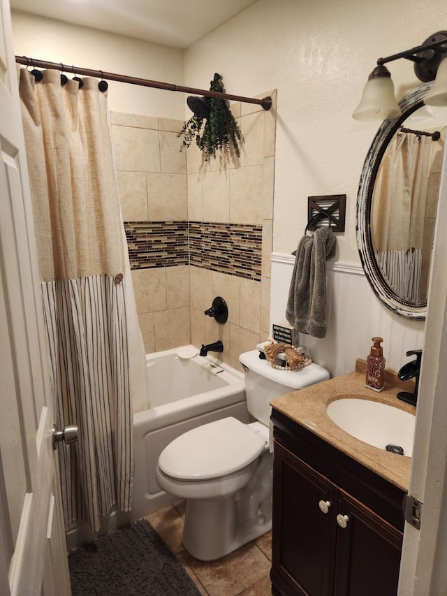 full bathroom with toilet, vanity, and shower / bath combination with curtain