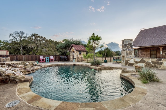 view of pool featuring a patio