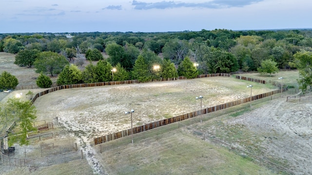 birds eye view of property featuring a rural view