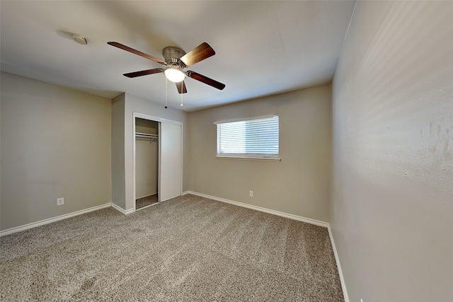 unfurnished bedroom featuring carpet flooring, a closet, and ceiling fan