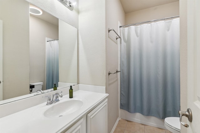 full bathroom featuring vanity, shower / tub combo, tile patterned floors, and toilet