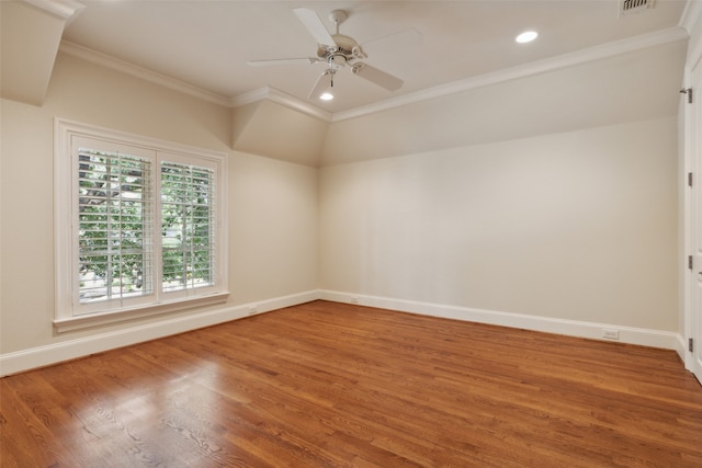 empty room with hardwood / wood-style floors, ceiling fan, and crown molding