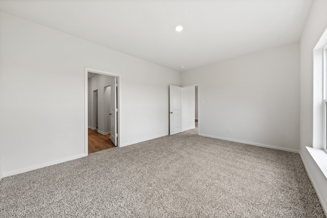 unfurnished bedroom featuring carpet