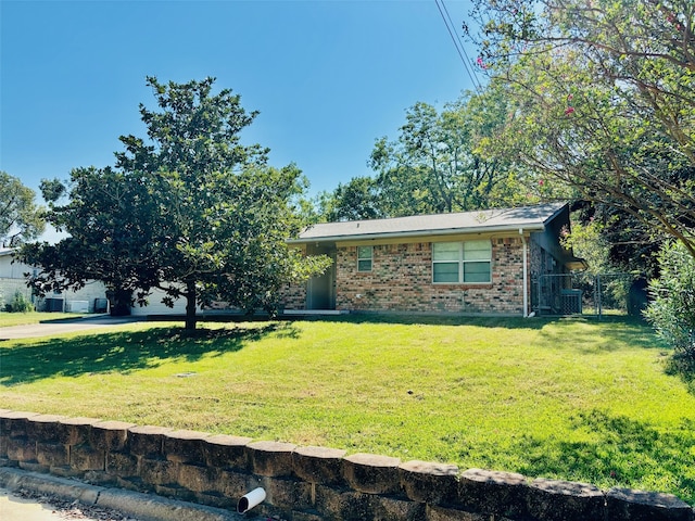 view of front of house with a front lawn