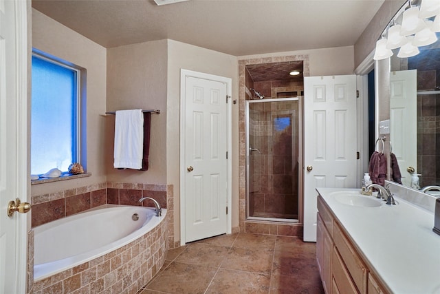 bathroom with vanity, separate shower and tub, and tile patterned flooring