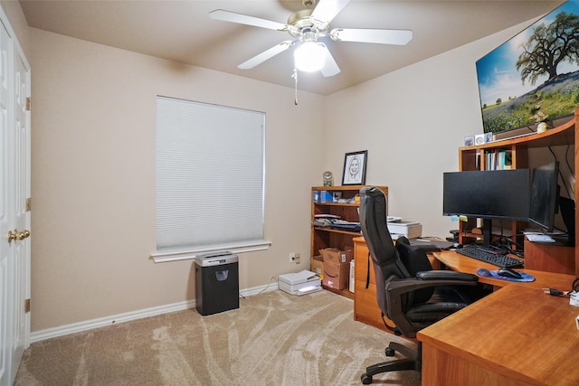 home office with light colored carpet and ceiling fan