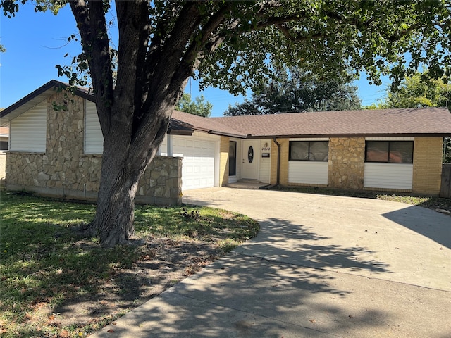 ranch-style home with a garage