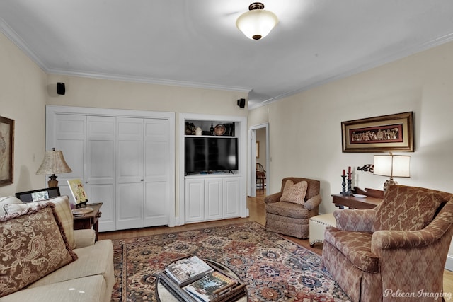 living room with ornamental molding and wood-type flooring