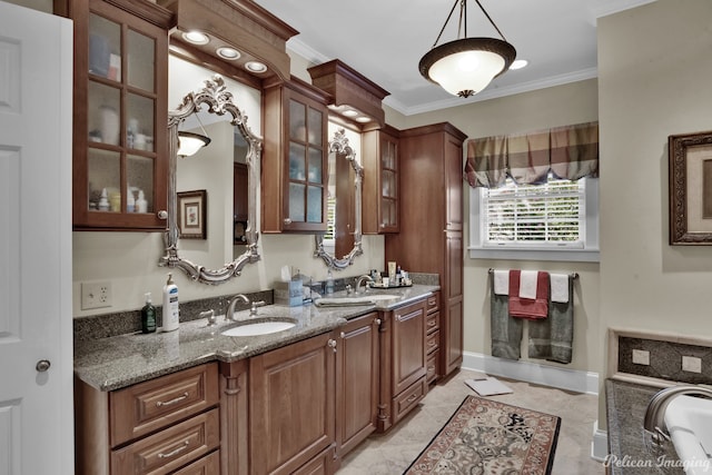 bathroom featuring vanity, a tub, and ornamental molding