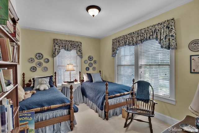 bedroom featuring ornamental molding, light carpet, and multiple windows