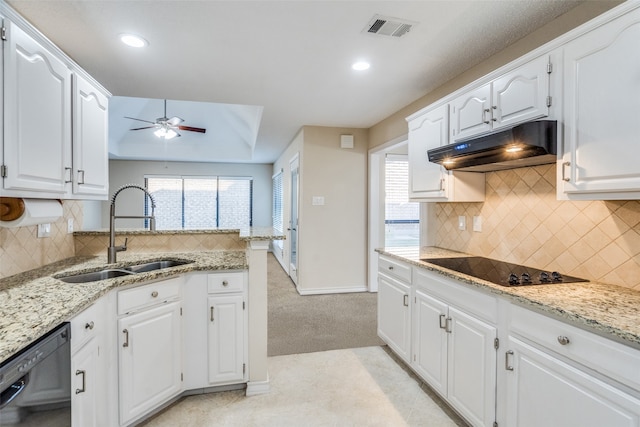 kitchen featuring light carpet, black appliances, white cabinets, sink, and ceiling fan