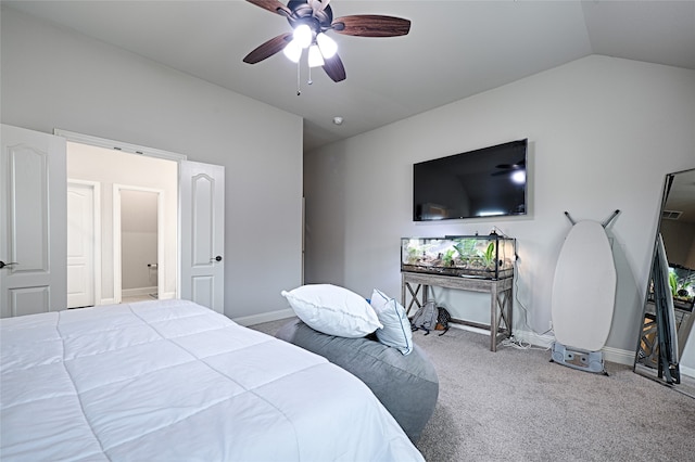 bedroom featuring ceiling fan, lofted ceiling, and carpet floors