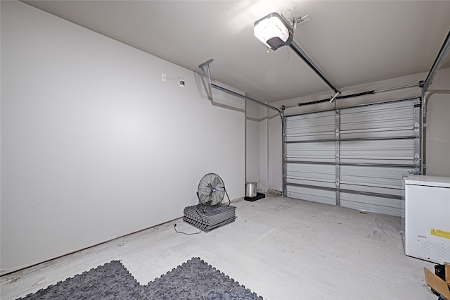 garage featuring a garage door opener