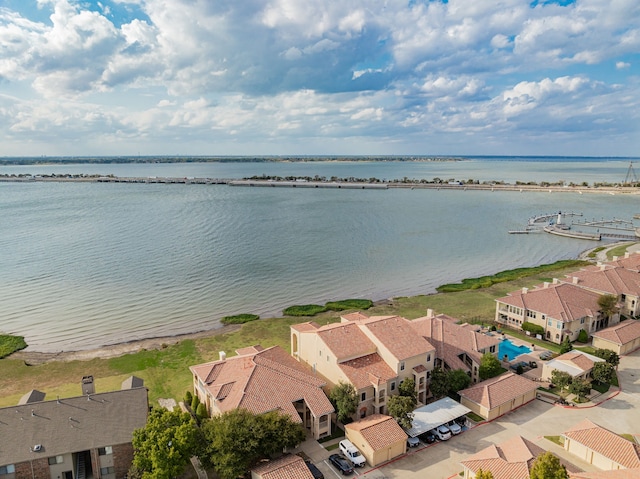 birds eye view of property featuring a residential view and a water view