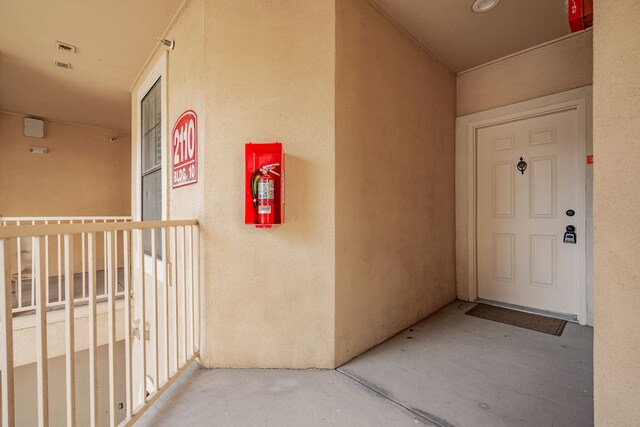 2120 Portofino Dr, Rockwall, TX 75032 - view of exterior entry featuring stucco siding