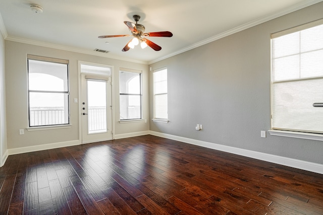 unfurnished room featuring crown molding, dark hardwood / wood-style floors, and ceiling fan