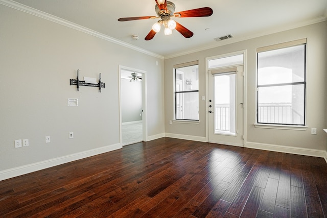 unfurnished room featuring ceiling fan, crown molding, and dark hardwood / wood-style floors