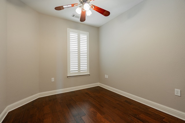 spare room with ceiling fan and hardwood / wood-style flooring