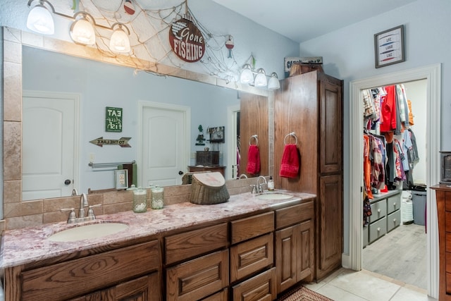 bathroom with vanity and tile patterned floors