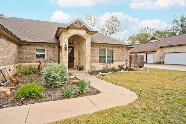 ranch-style house with a front lawn and a garage