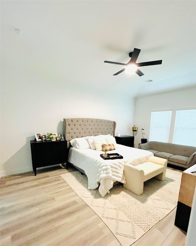 bedroom featuring ceiling fan and light hardwood / wood-style flooring