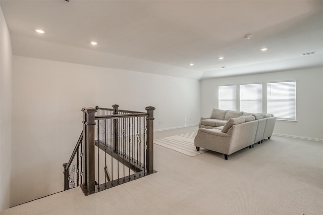 living room with light colored carpet