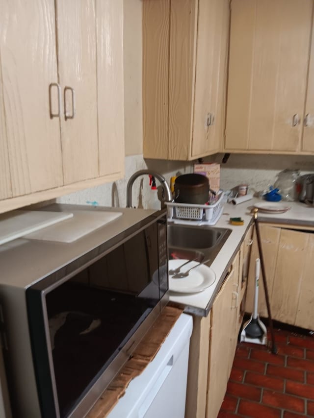 kitchen featuring light brown cabinets