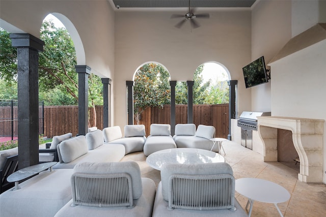 view of patio / terrace featuring ceiling fan, an outdoor hangout area, and a grill