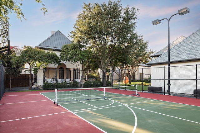 view of basketball court with tennis court