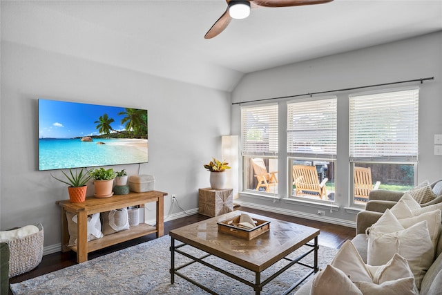 living room featuring dark hardwood / wood-style floors, ceiling fan, and lofted ceiling