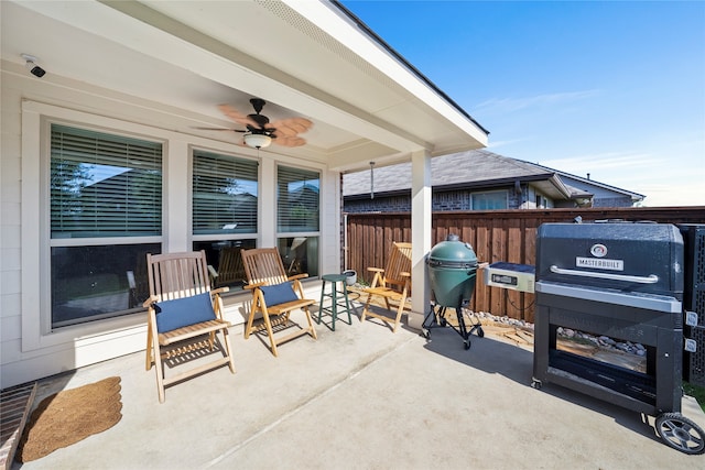 view of patio featuring a grill and ceiling fan